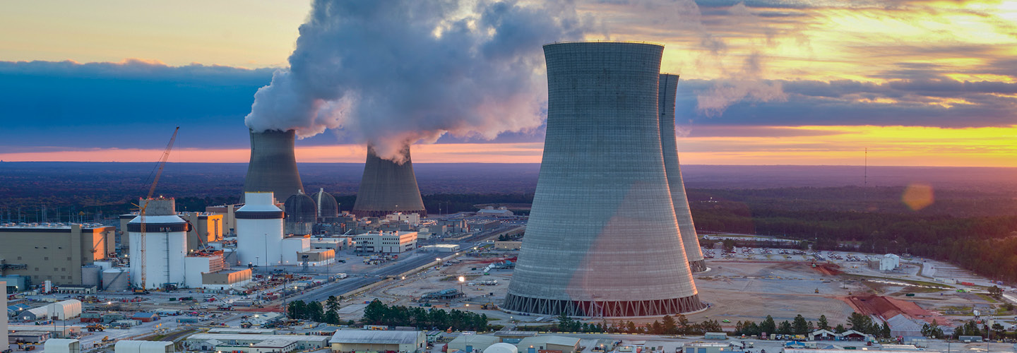 Photo of a nuclear power plant polluting the air